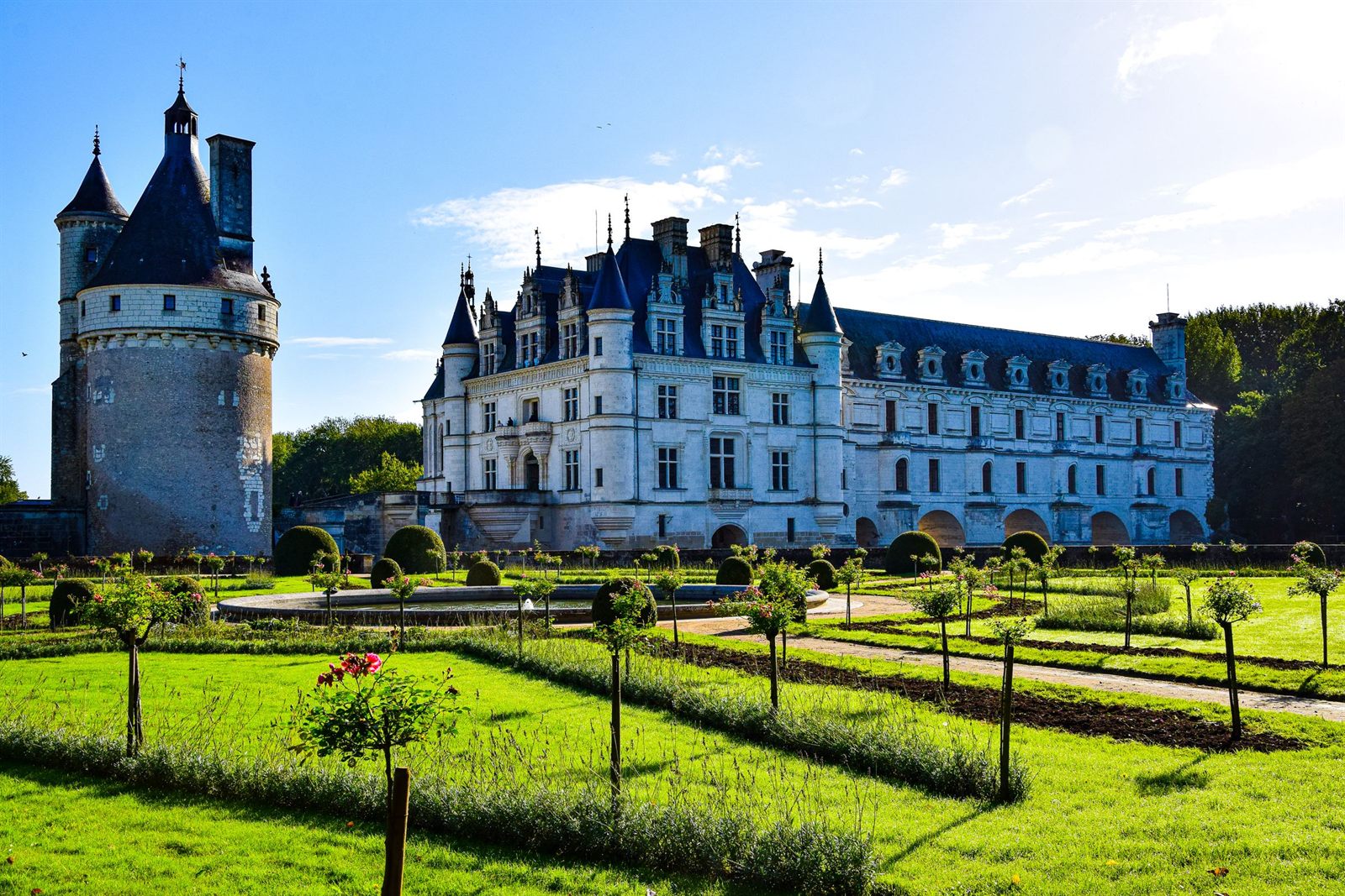 Château de Chenonceau and its round tower beyond formal gardens in the Loire Valley